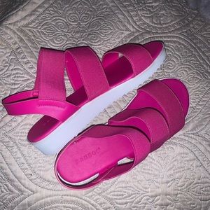 Pink platform sandals, from purple door boutique.